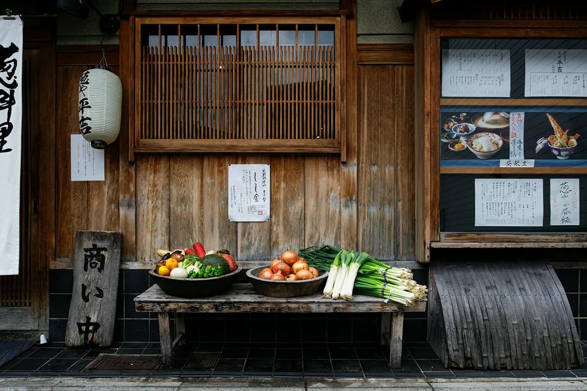 Traditional Japanese storefront with offerings